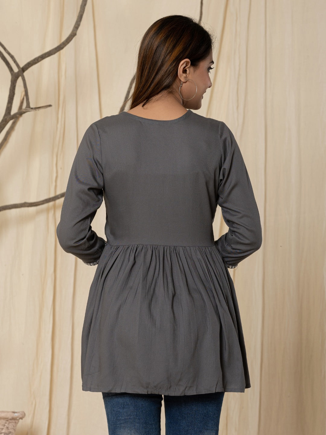 Solid Embroidered Peplum Top -Grey