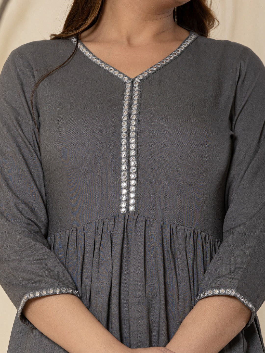 Solid Embroidered Peplum Top -Grey