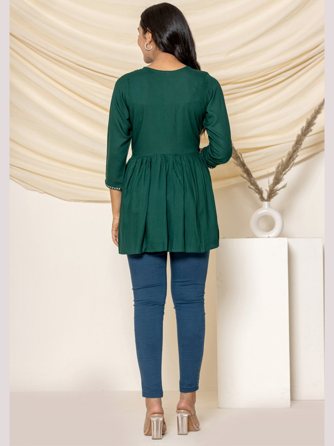 Solid Embroidered Peplum Top - Bottle Green