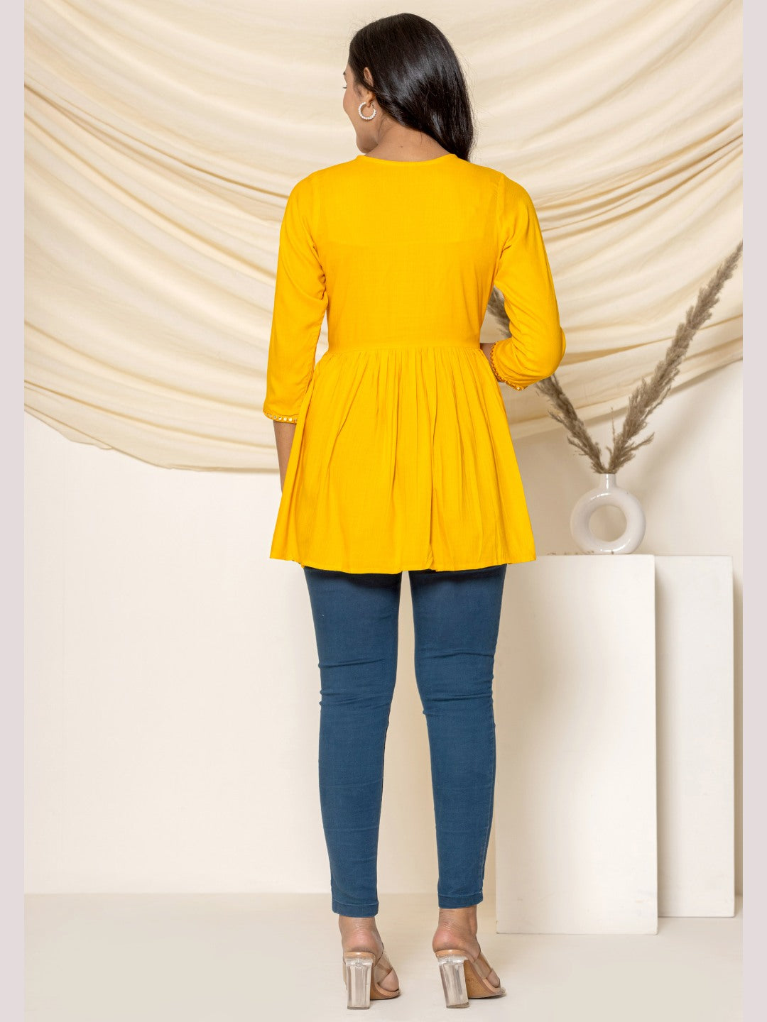 Solid Embroidered Peplum Top - Mustard