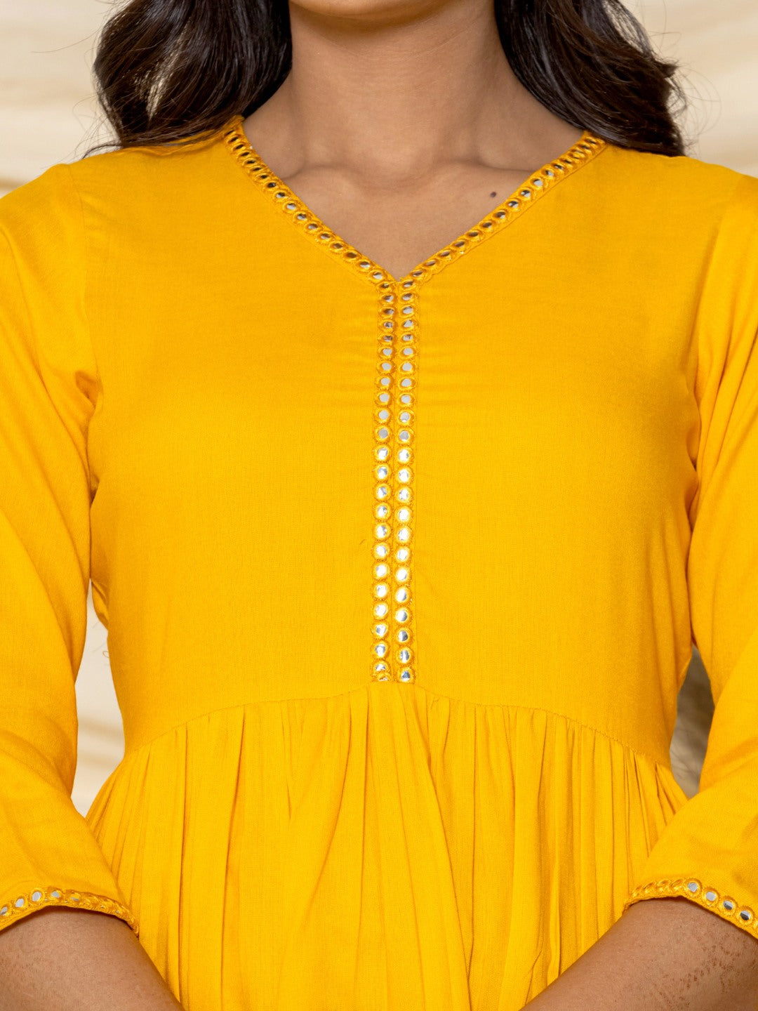 Solid Embroidered Peplum Top - Mustard