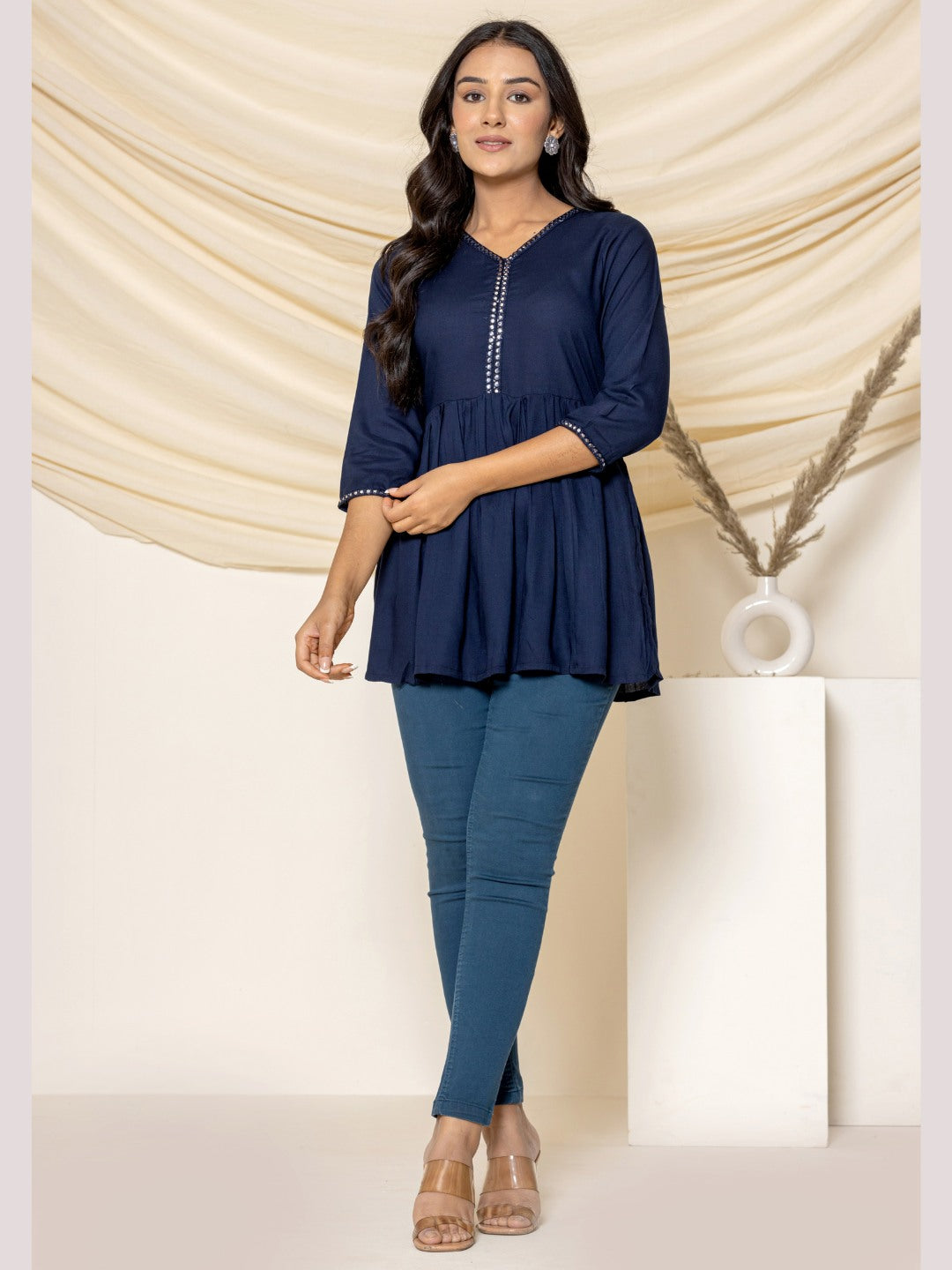 Solid Embroidered Peplum Top - Navy