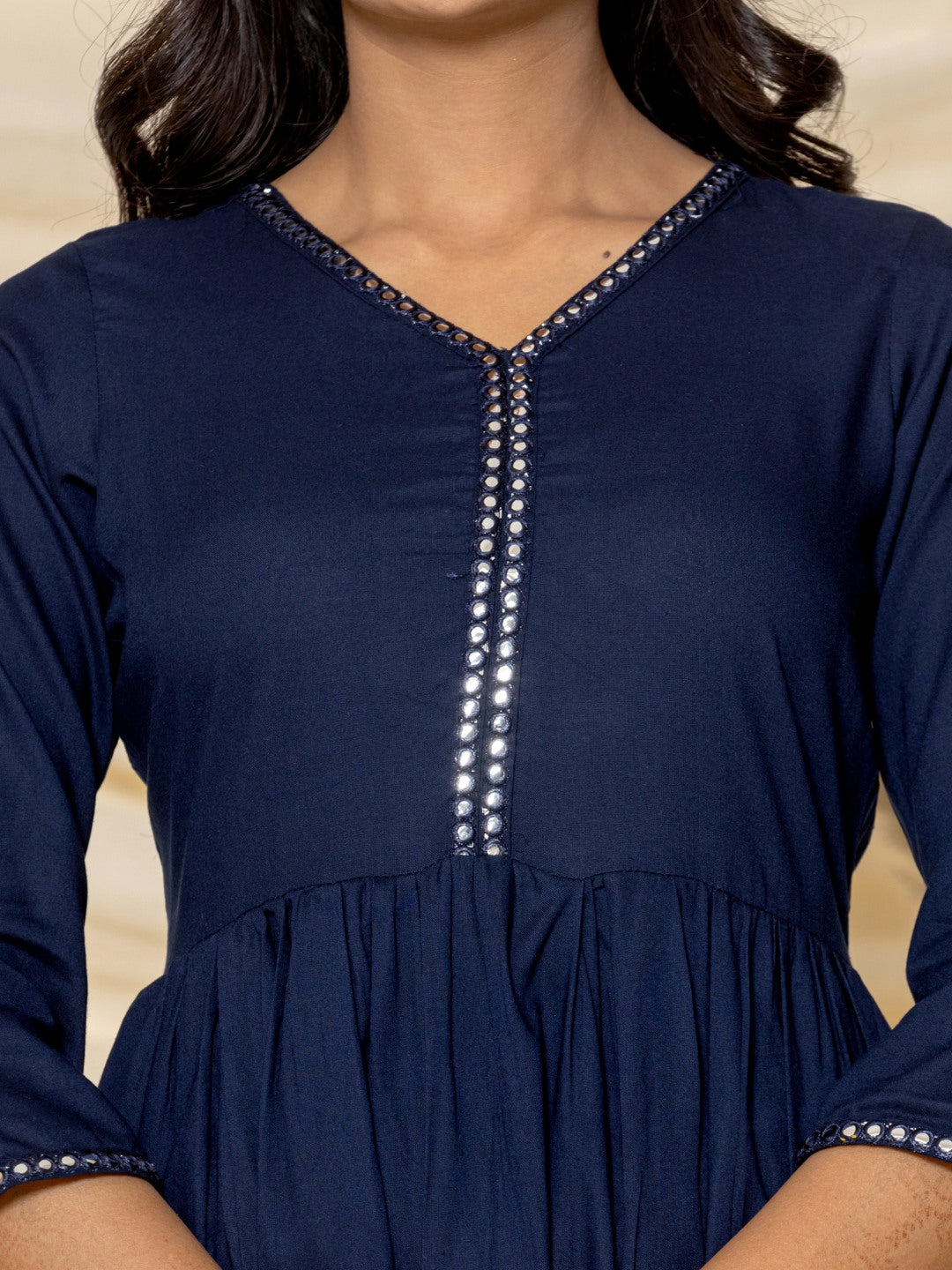 Solid Embroidered Peplum Top - Navy