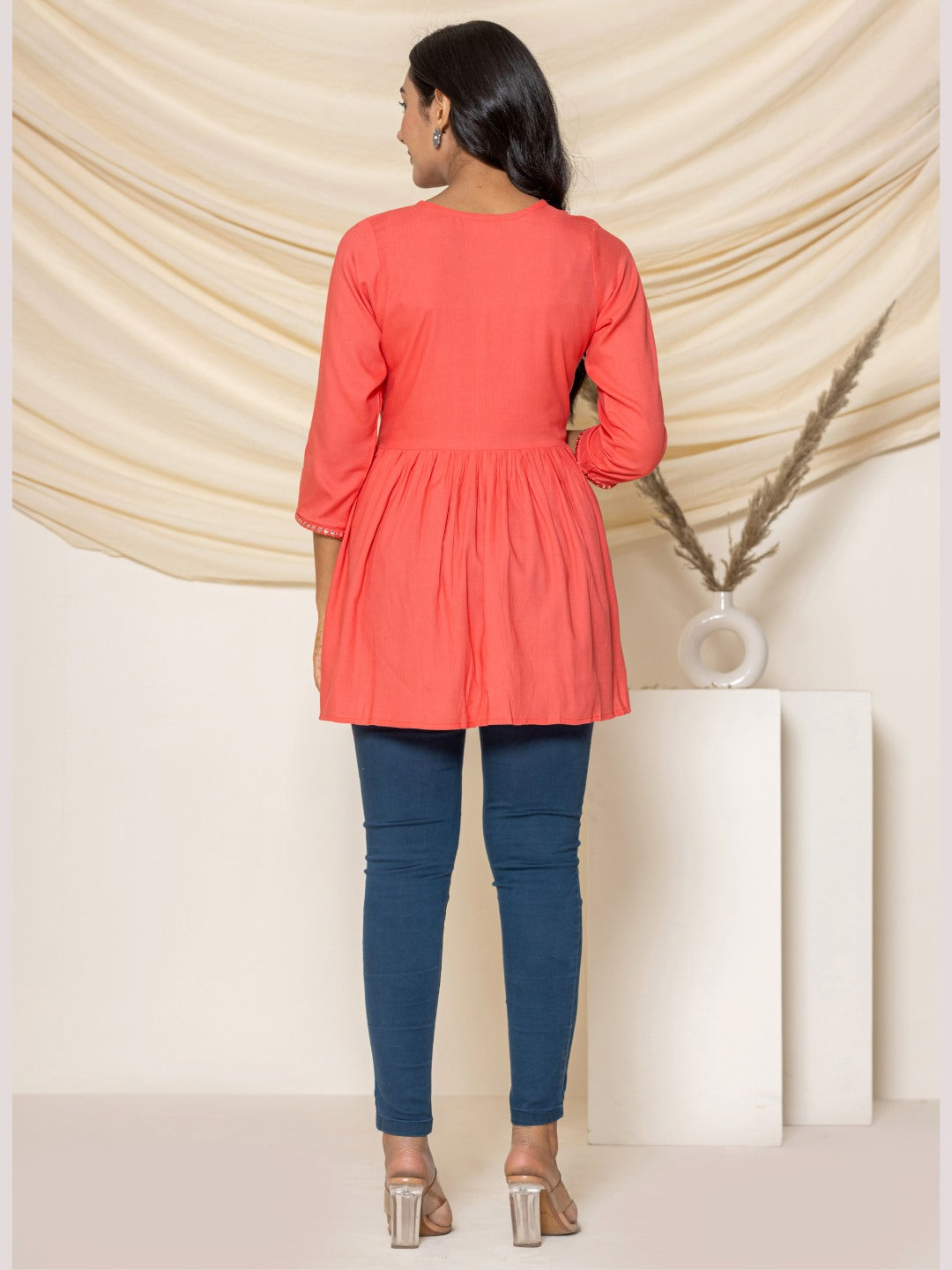 Solid Embroidered Peplum Top - Peach