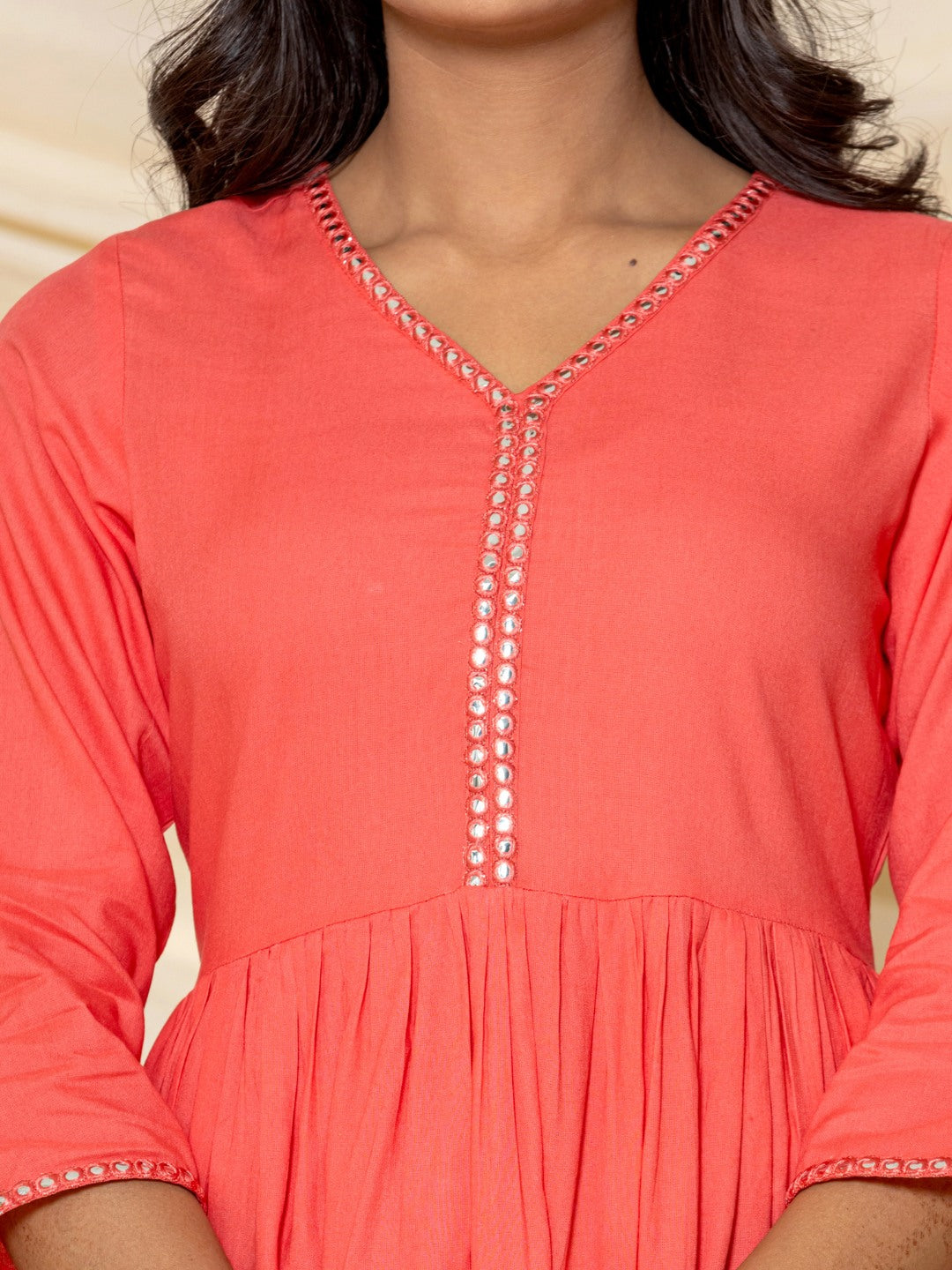 Solid Embroidered Peplum Top - Peach